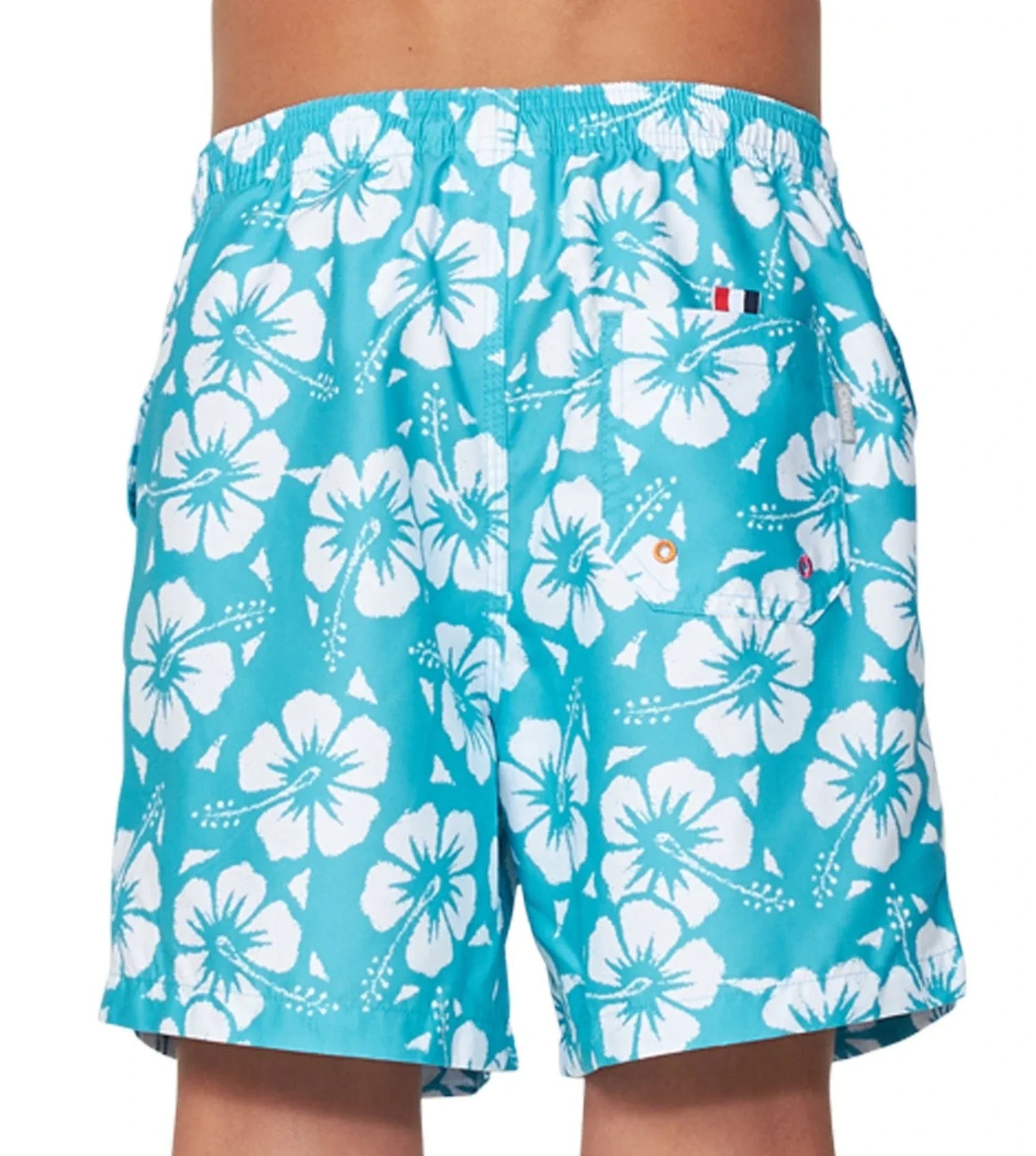 Back view of the Okanui boys swim shorts in Hibiscus Aqua