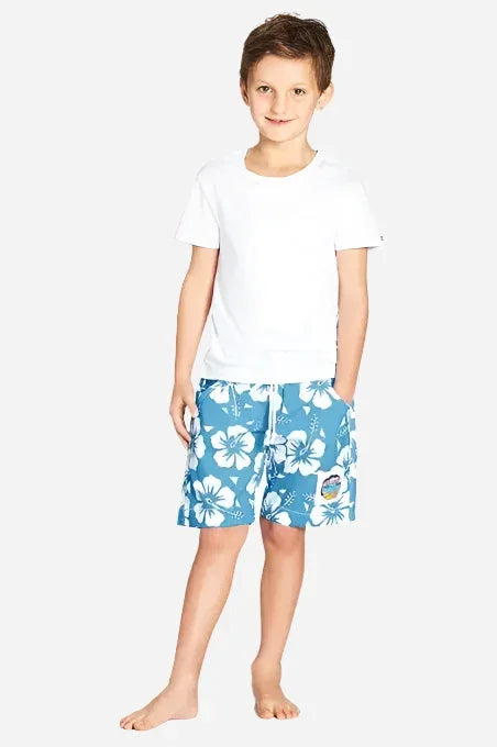 The classic Kids Okanui short with white and blue hibiscus flower.
