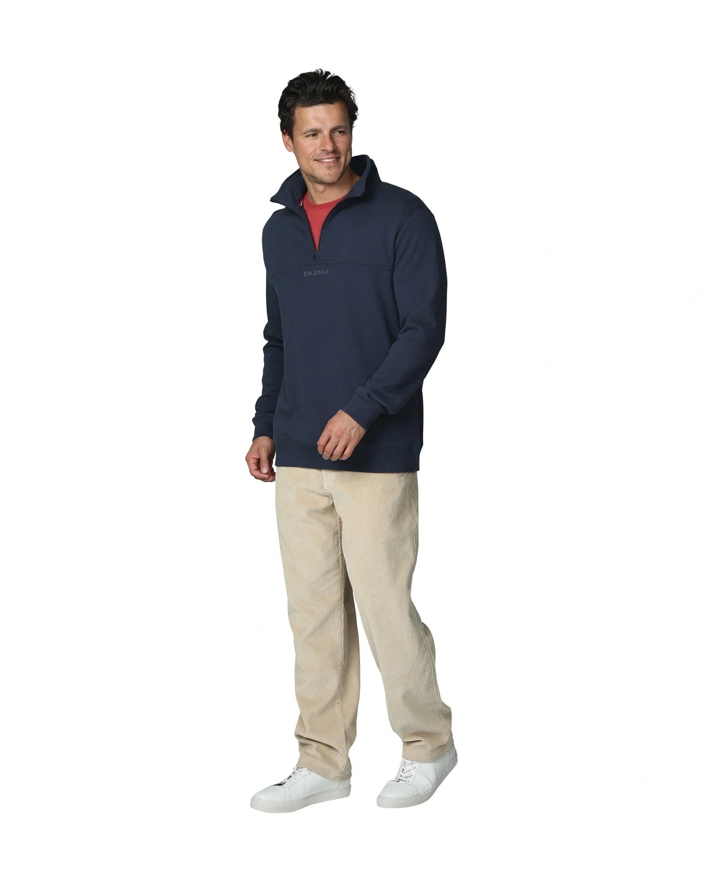 a sweatshirt in the color navy blue with a red shirt inside showing the side part.