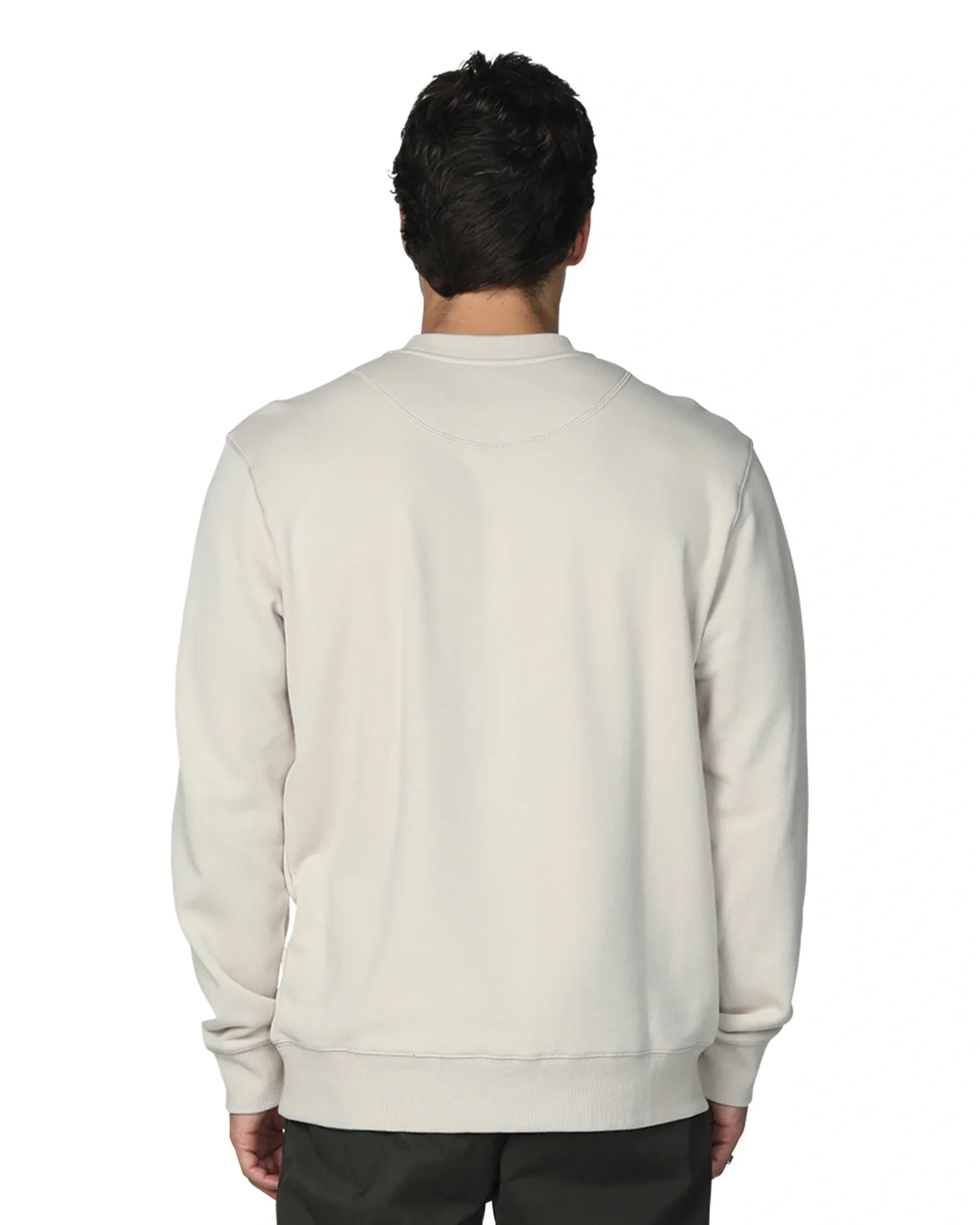 a comfortable white sweatshirt with in a white backrop.