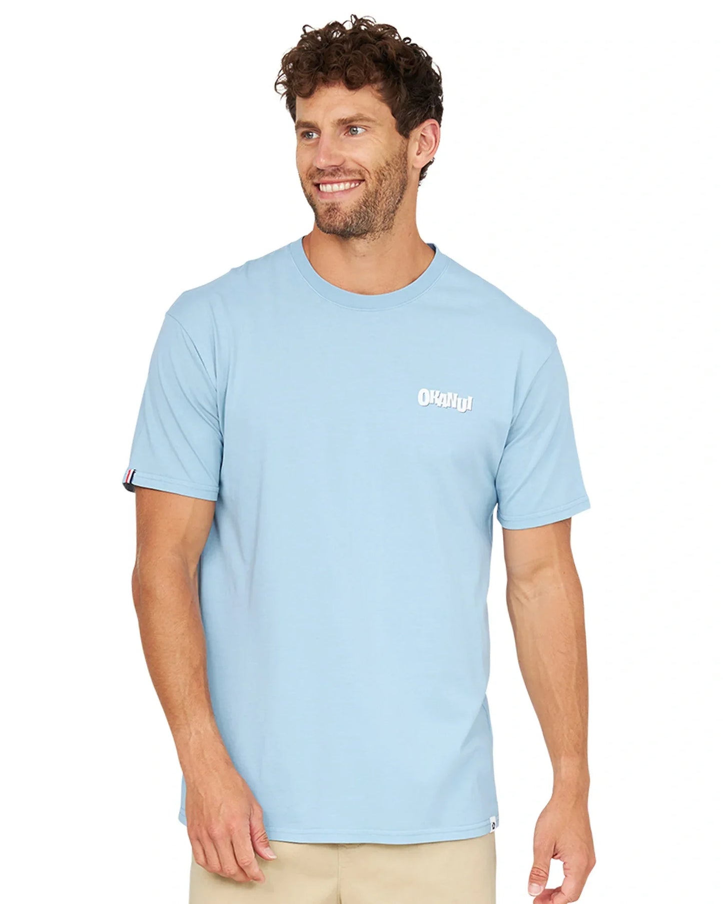 A closer front view of the Okanui Biskus Badge T-Shirt in steel blue color.