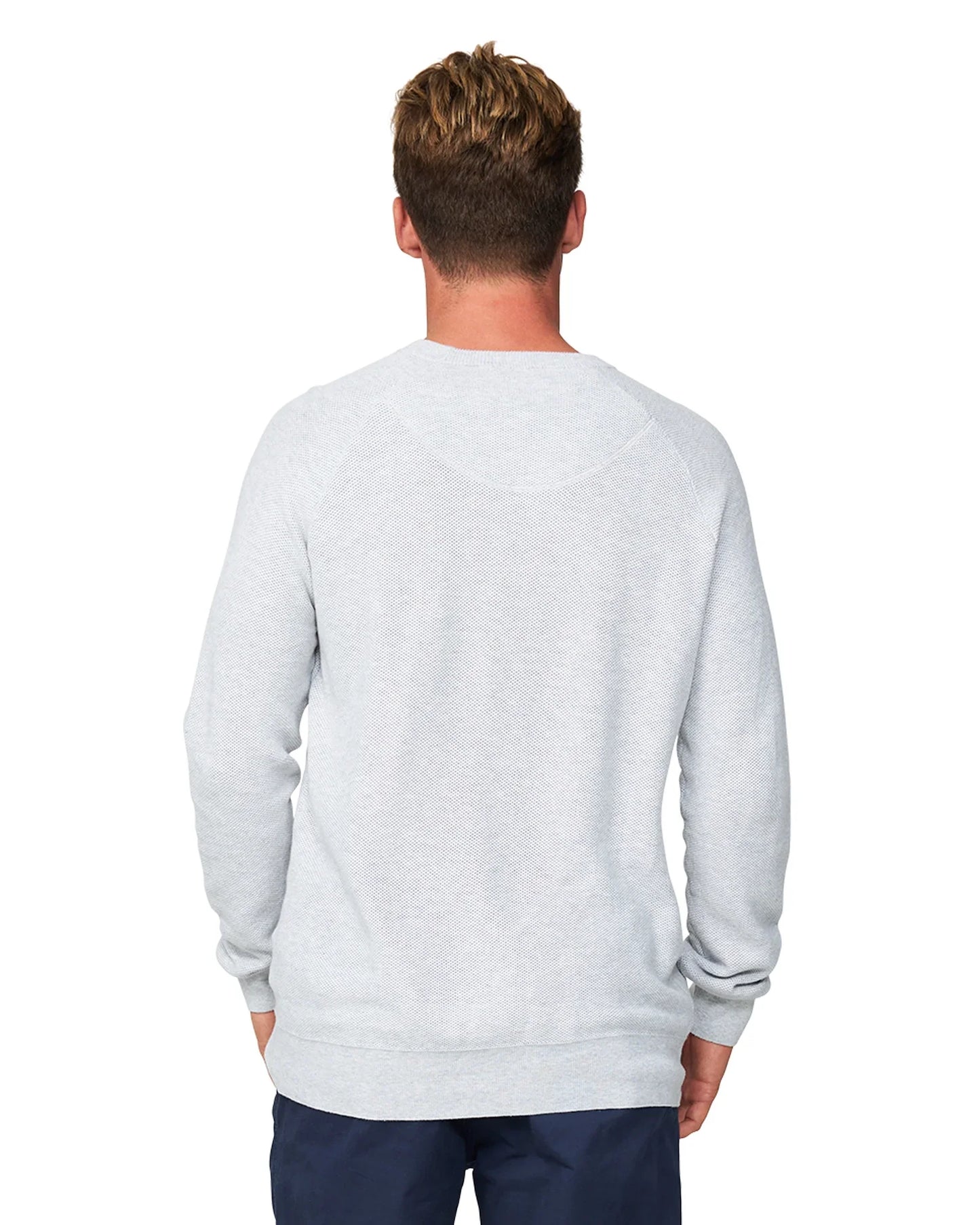 A closer back view of the Okanui Anchor Knit in Snow Marle color.