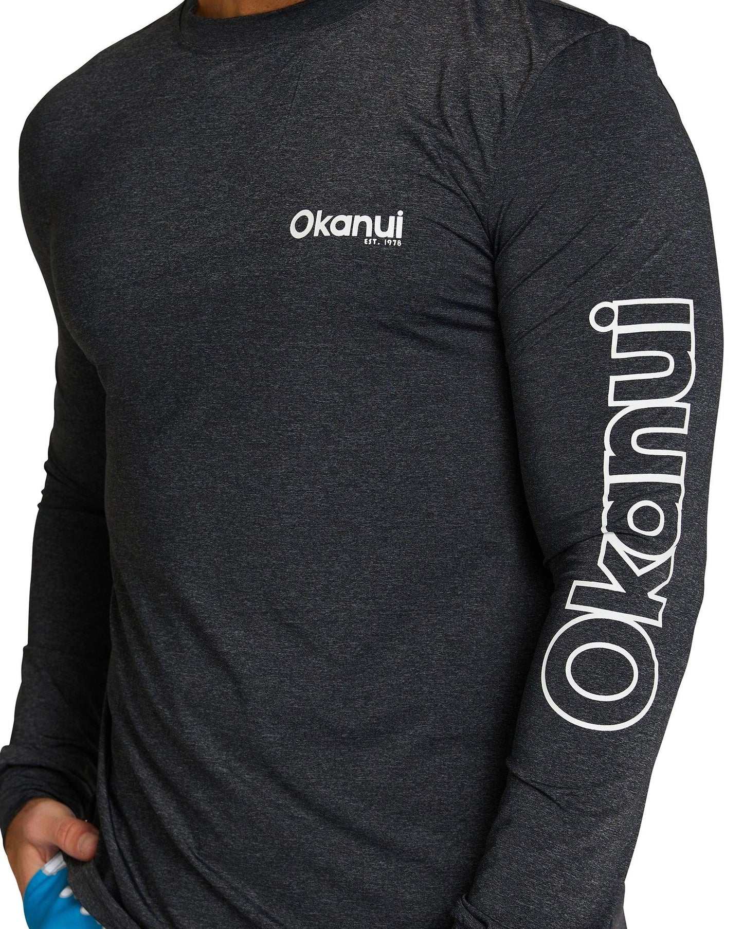 Full details of The Okanui Men's spring long sleeve rashie in black marle.