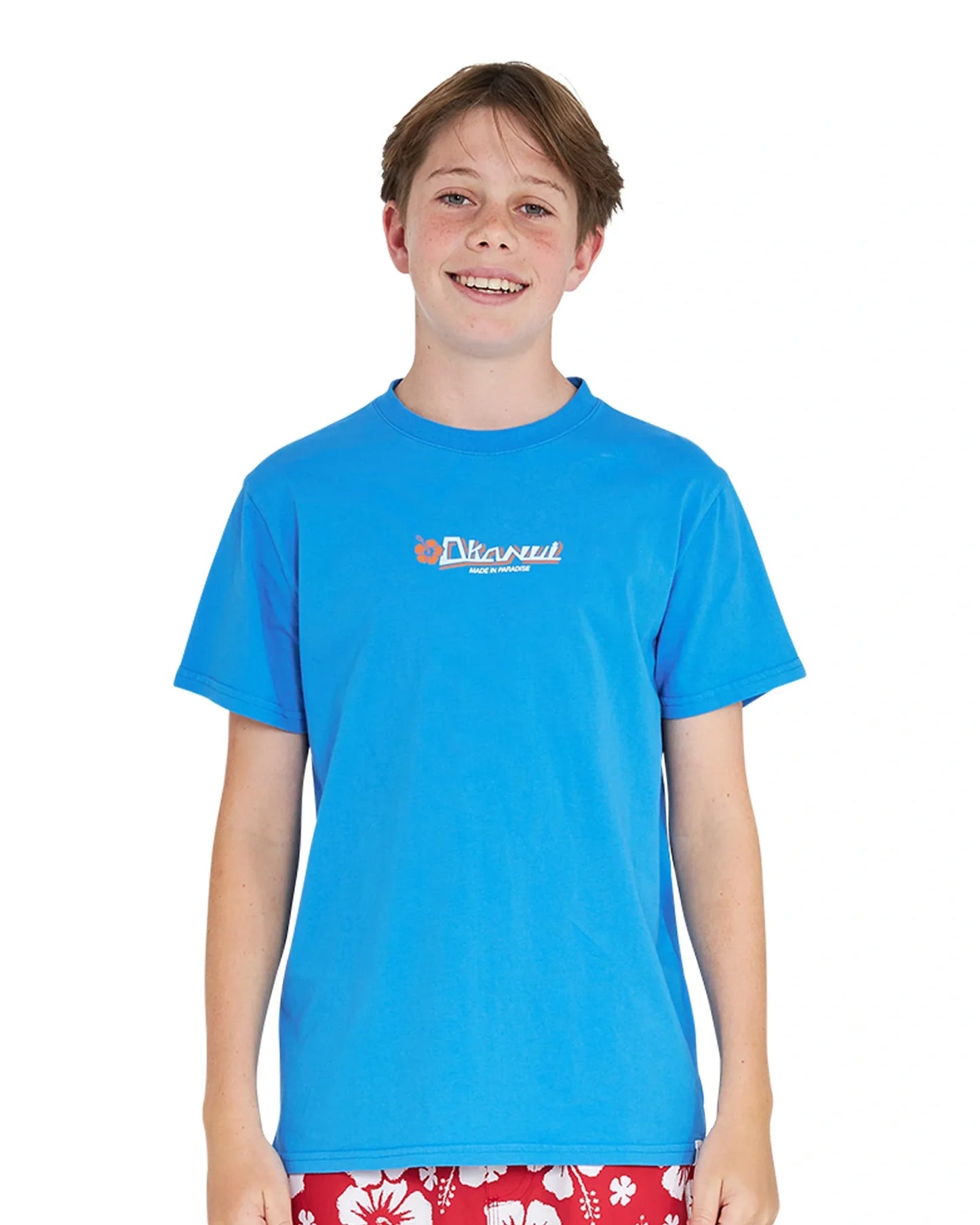 Front view of a boy wearing the Okanui Point Break Tee T-shirt in Washed Blue