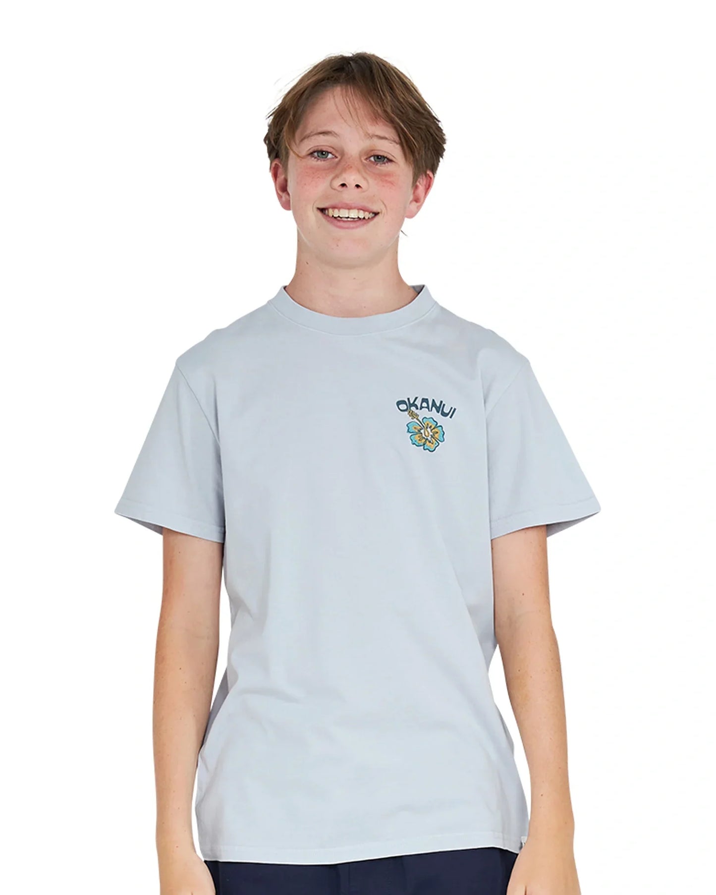 Close up front view of a boy wearing the Okanui Final Destination Tee T-shirt in Washed Grey