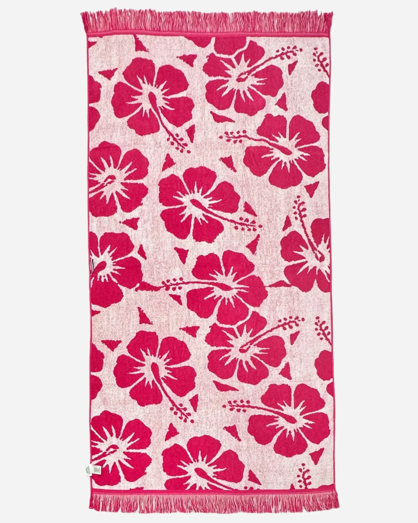 Inner side of the Okanui Large Beach Towel in Hibiscus Glow Pink