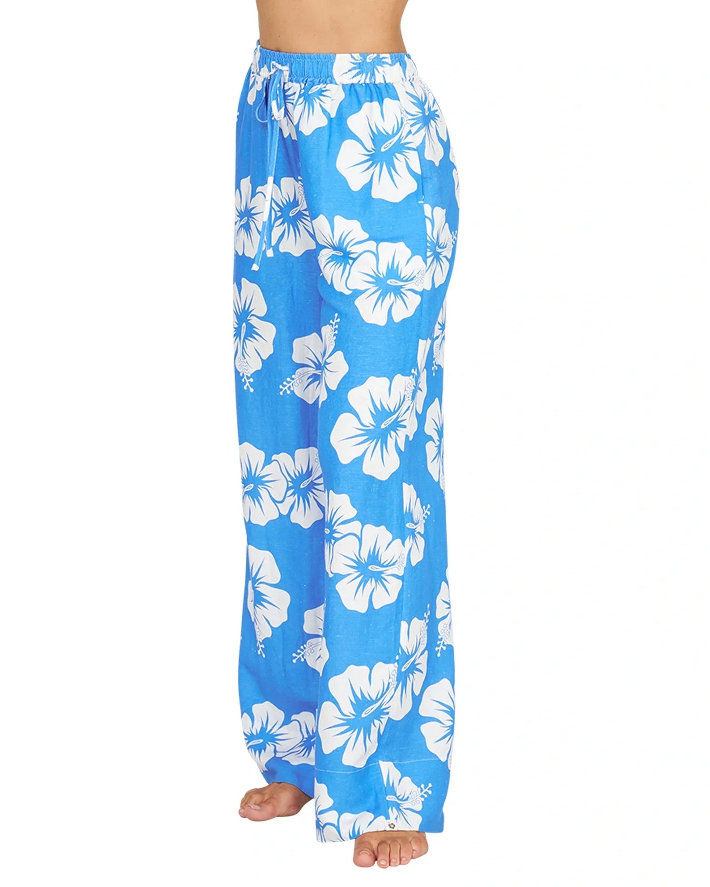 Okanui summer pants in hibiscus bold blue showing the side details.