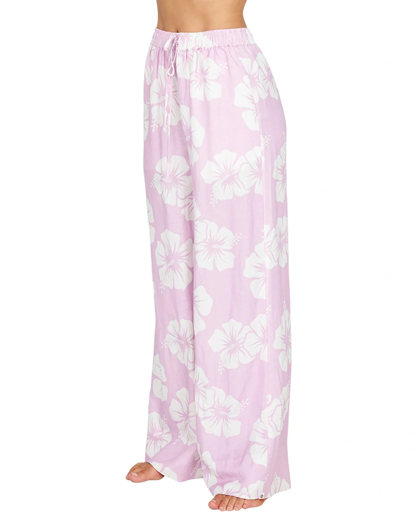 Okanui summer pants in hibiscus pale pink showing the side details.