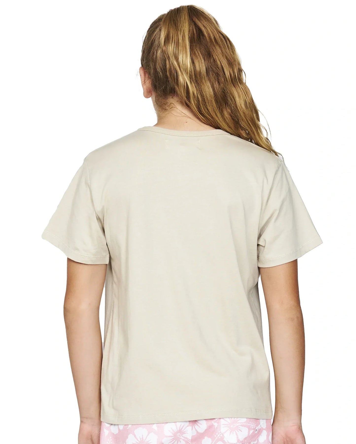 Close up back view of a girl wearing the Okanui Confused Tee T-shirt in Stone