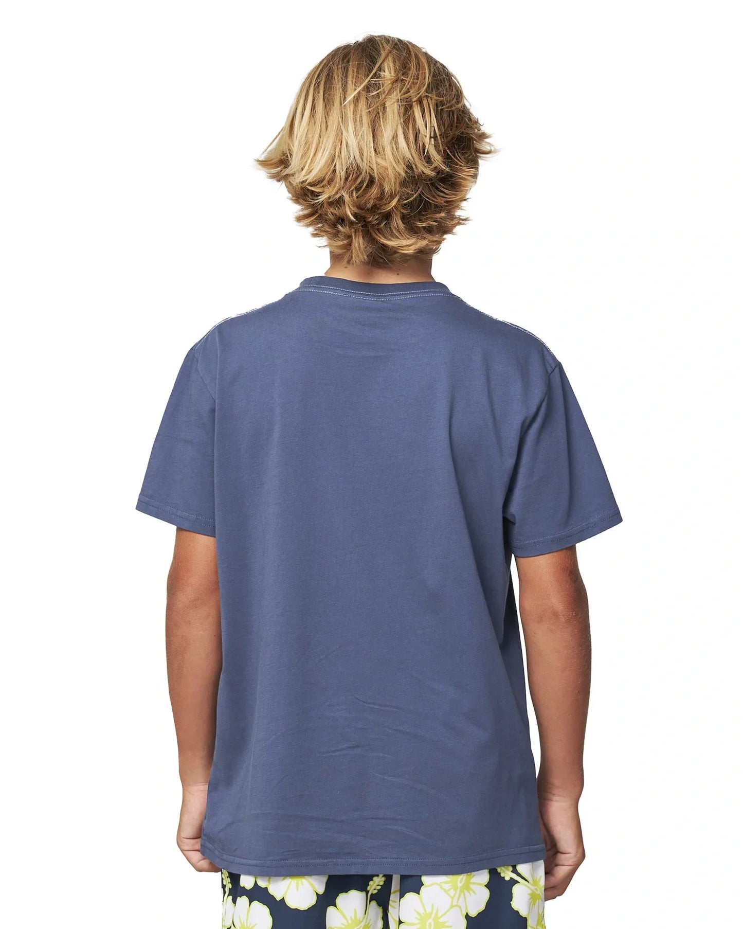 Close up back view of a boy wearing the Okanui Kids Deck Tee T-shirt in Washed Navy