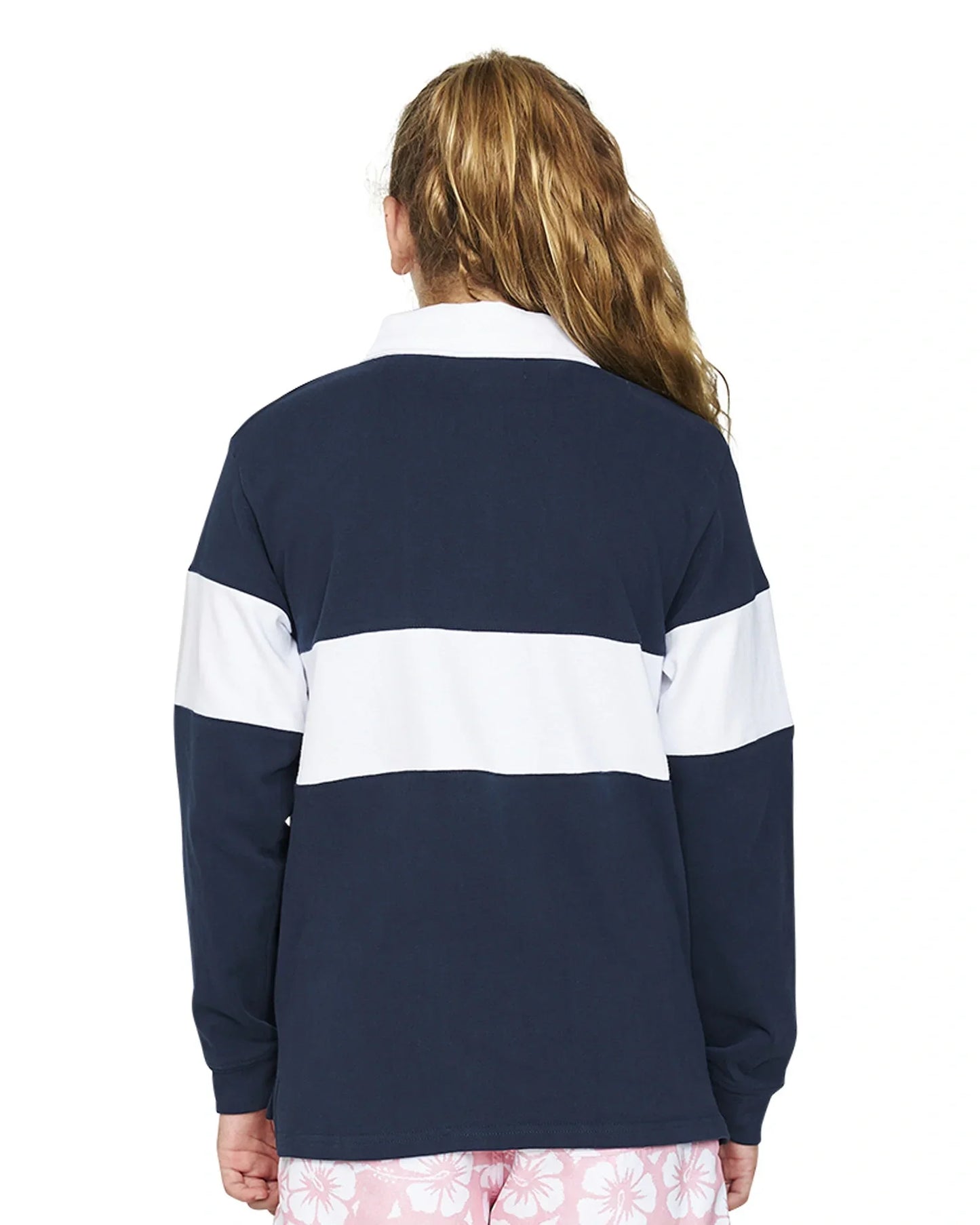 Closeup back view of a girl wearing the Okanui Girls Heritage long sleeve Rugby tops and jumpers in Navy/White