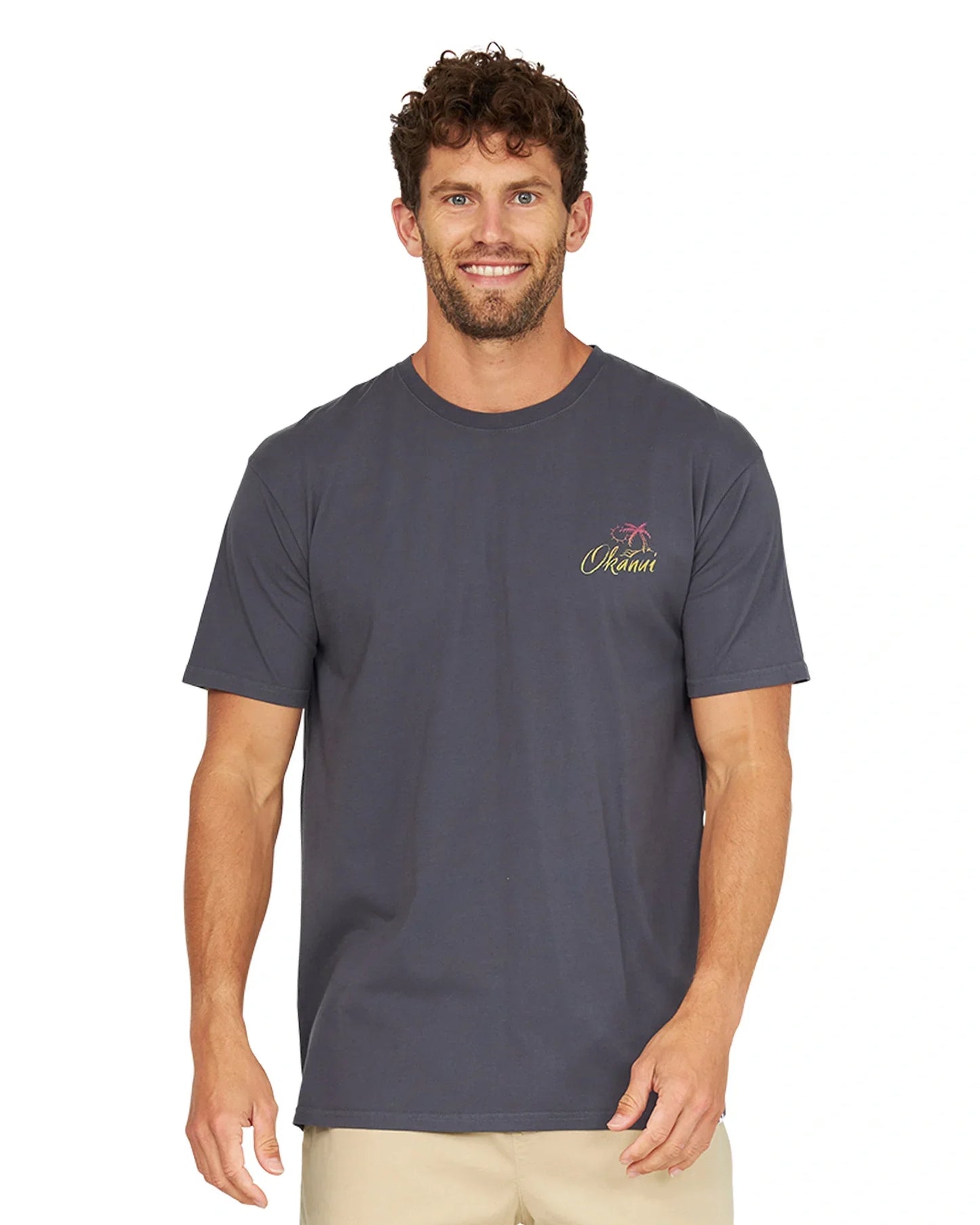 Front view of a male model posing wearing the Okanui Rising Sun Men’s T-Shirt in Washed Black.