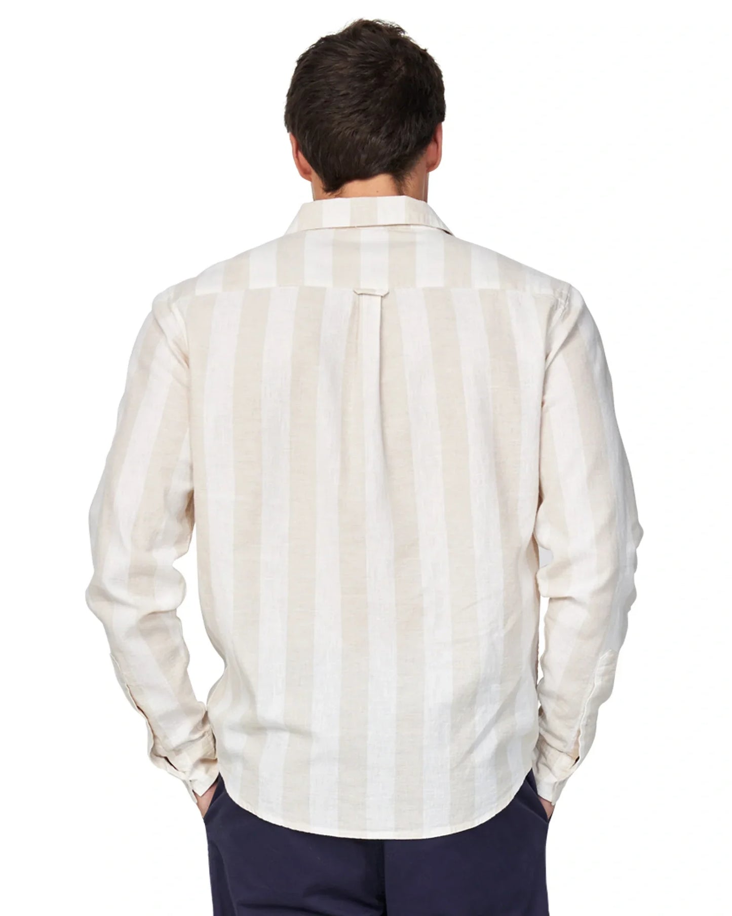 A closer back view of the Okanui Cove Long Sleeve Shirt in white sand colour.