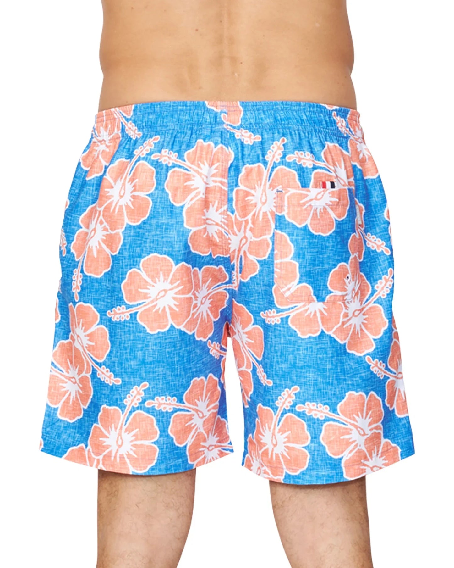 A lower back view of a male model wearing the Okanui Way Back When Swimshorts in Bright Blue/Orange colour emphasizing the elastic waist and single back pocket.