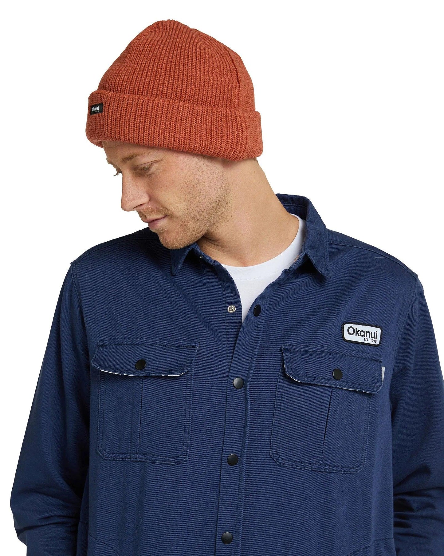 Mens navy blue jacket with rust color bonnet.