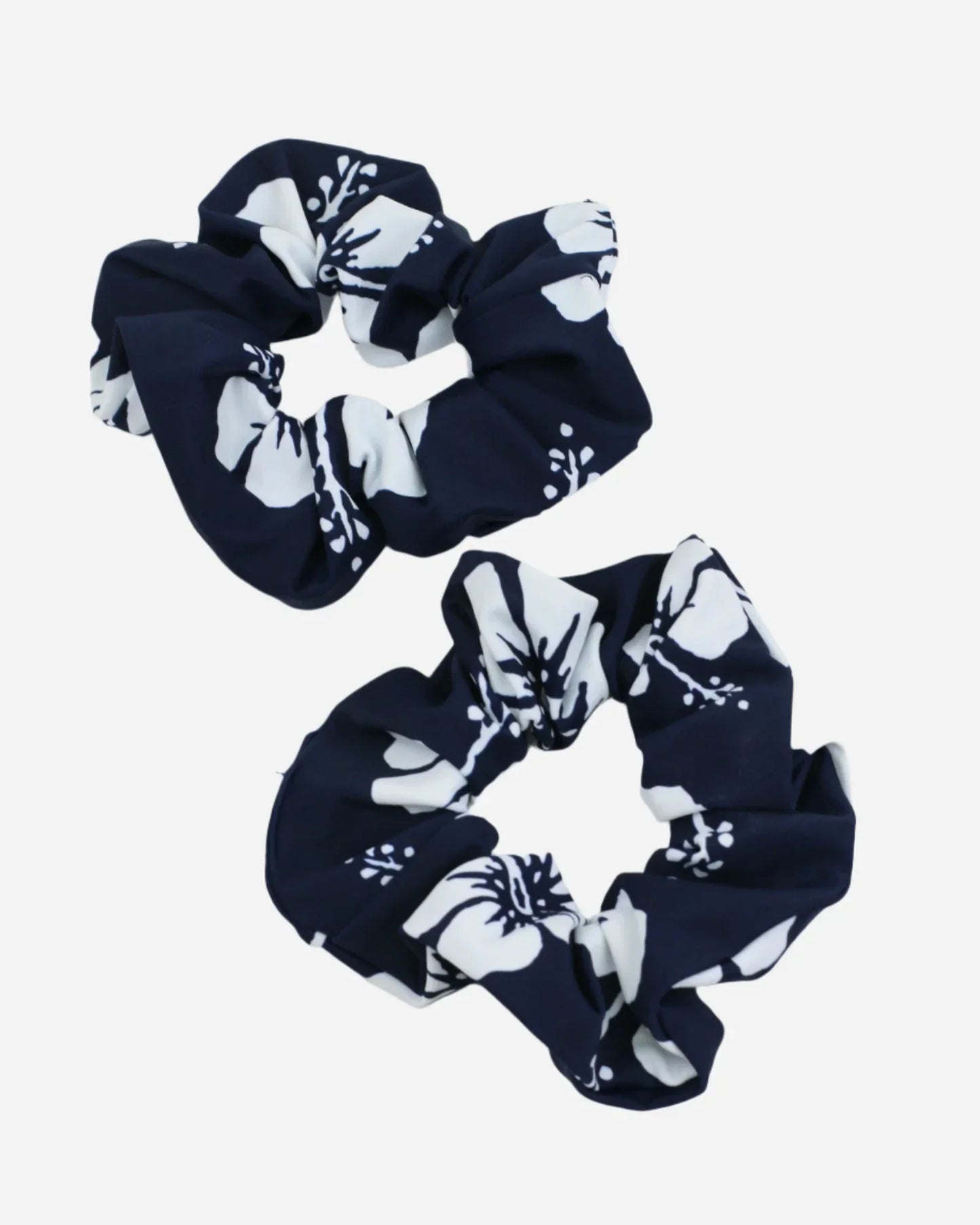 side to side photo of the Okanui hair scrunchie in navy white