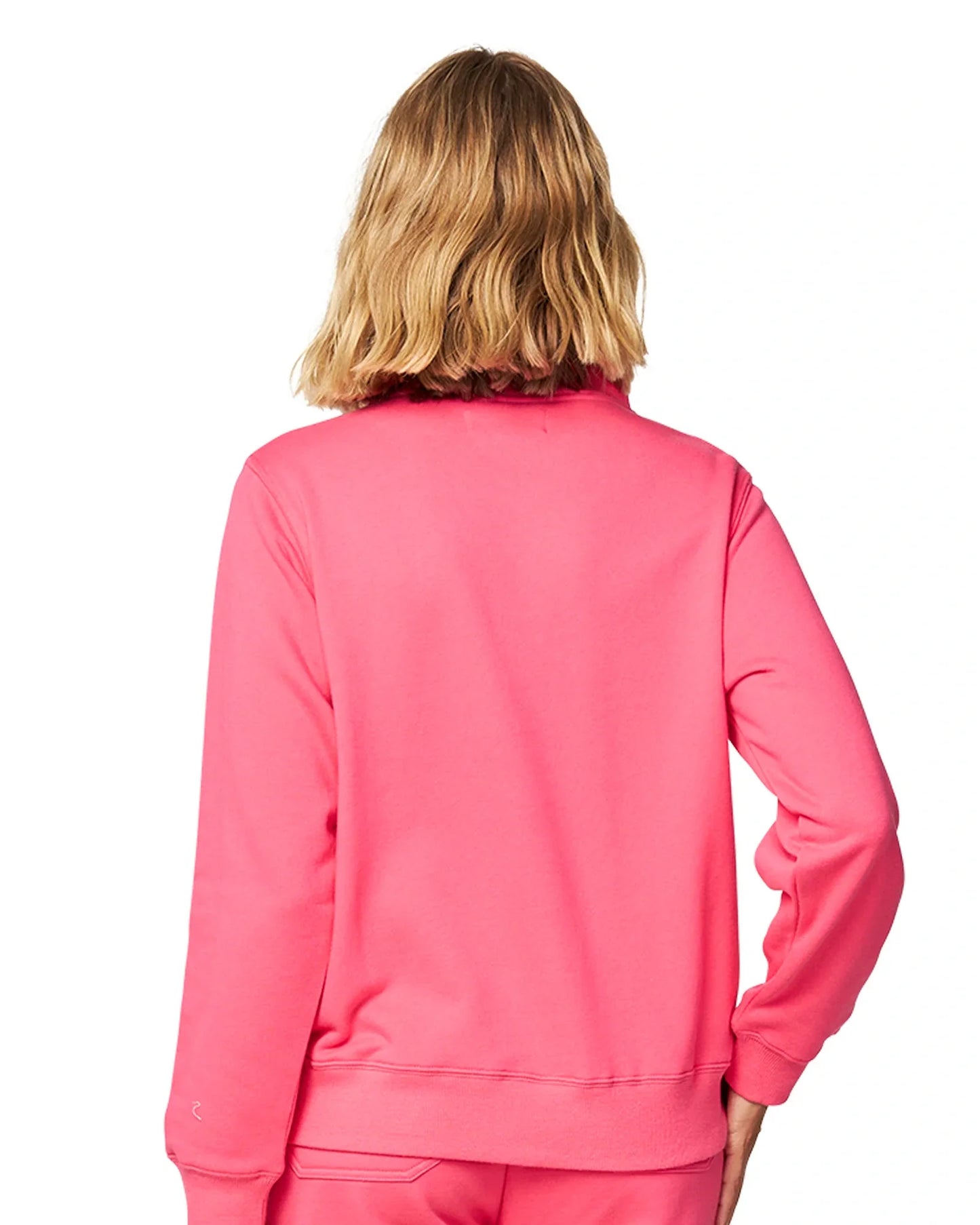 Women's hot pink autumn fleece showing the back part.