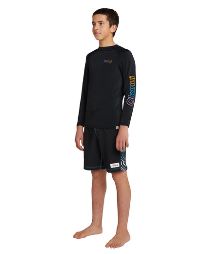 Front view of Okanui Boy's spring long sleeve rashie black showing the side details.