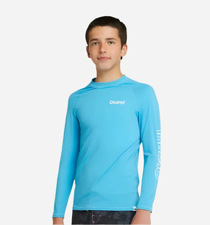 The Okanui Boy's Spring Long sleeve rashie in Storm blue.