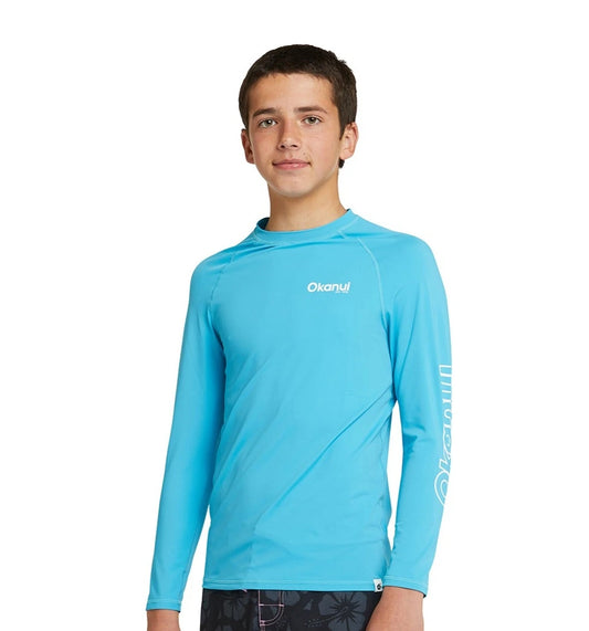 The Okanui Boy's Spring Long sleeve rashie in Storm blue.