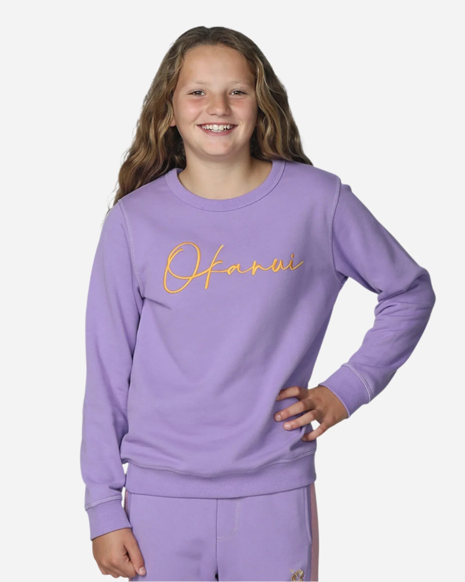 Girls' Winter sweater in lilac color. 