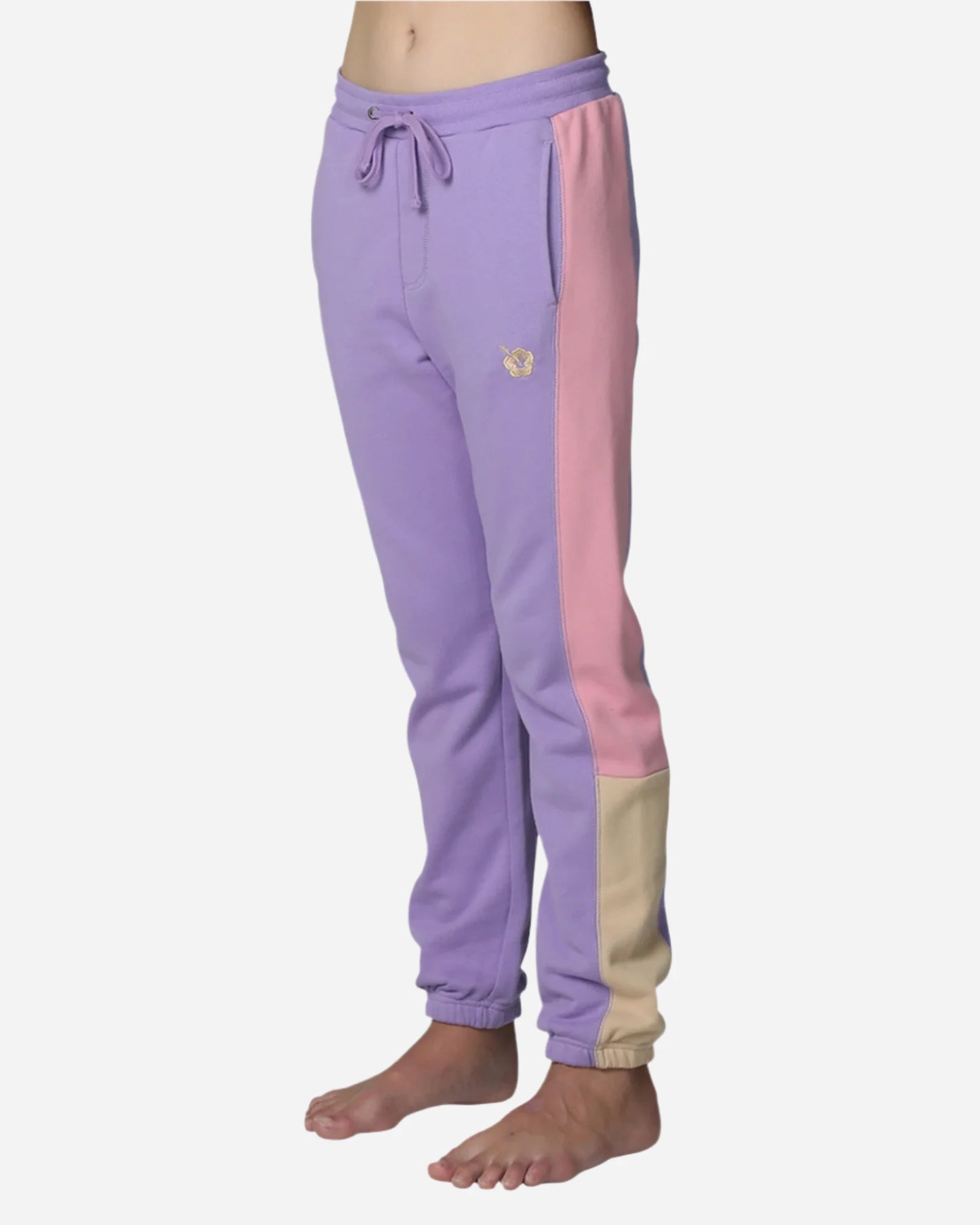 Okanui Girls trackpants in multi-colors showing the side part. 