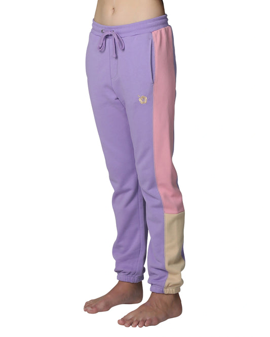 Okanui Girls trackpants in multi-colors showing the side part. 