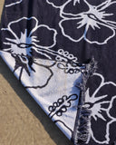 Close up details of Okanui CLassic Hibiscus Beach Towel in Navy