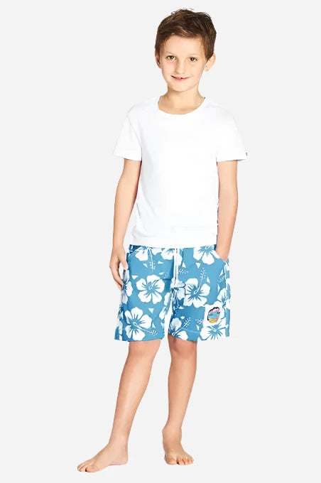 The classic Kids Okanui short with white and blue hibiscus flower. 