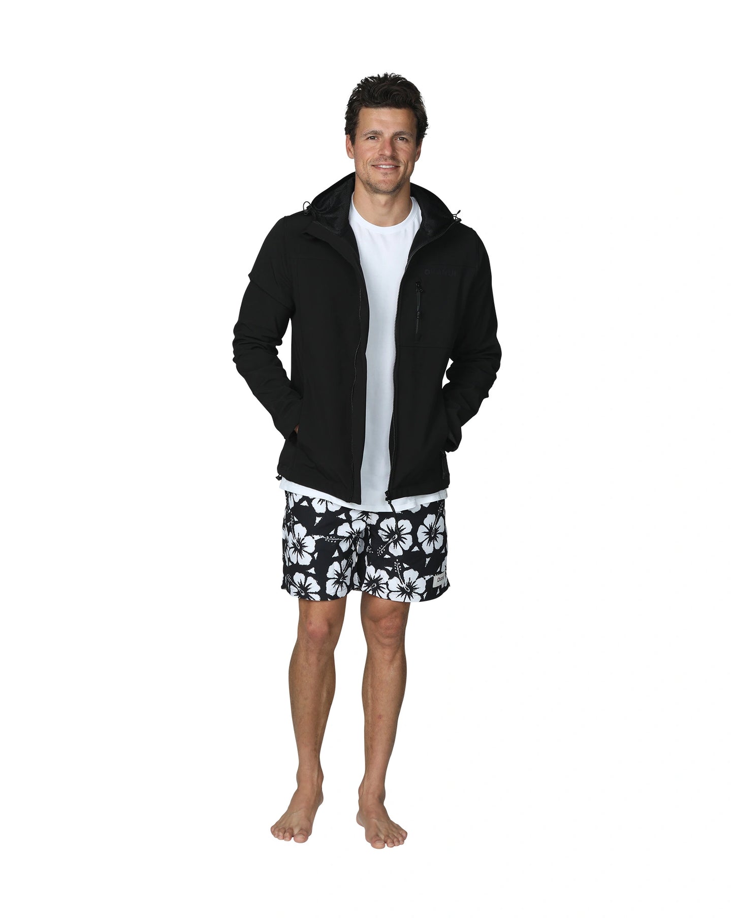 Mens soft shell jacket in color black with white and black hibiscus flower design. 