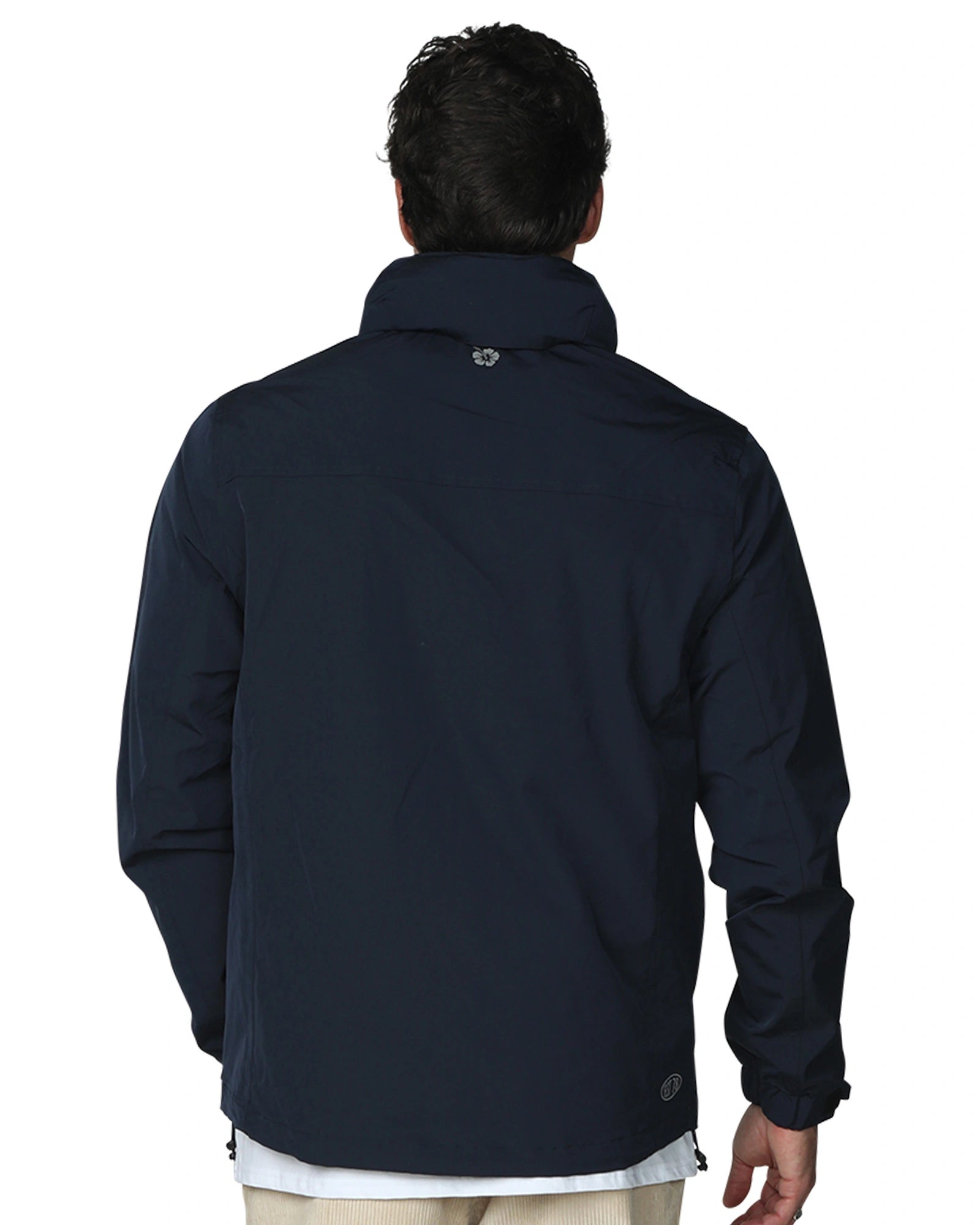 Mens winter surf jacket in navy blue color showing the back view. 