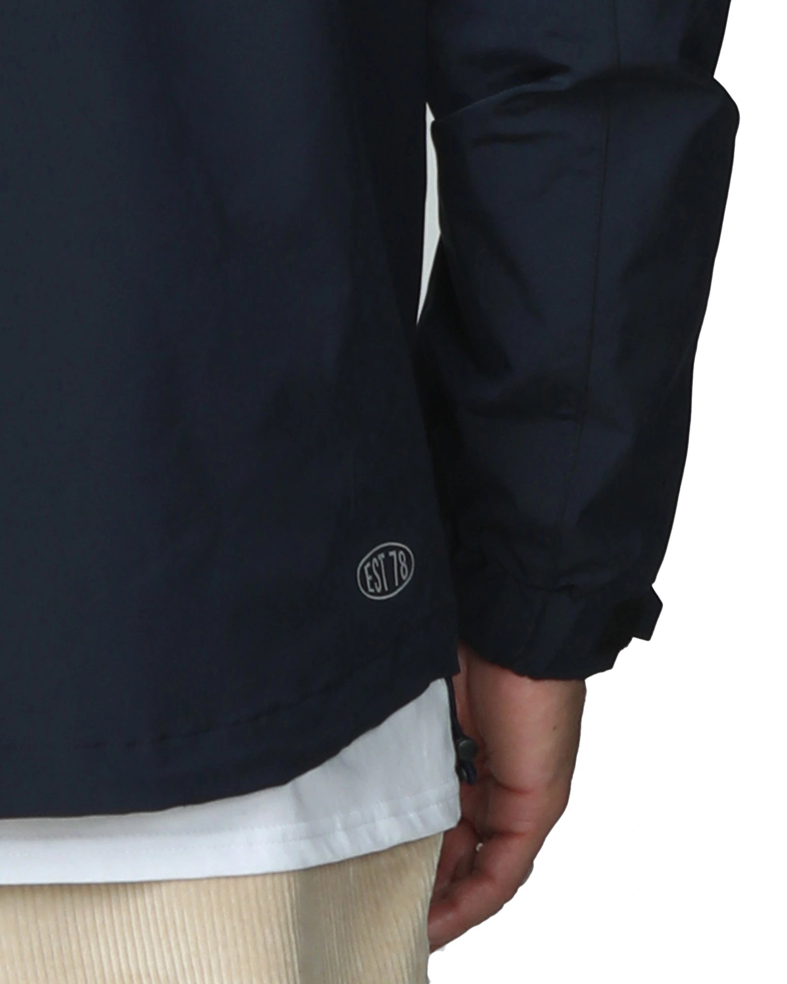 Mens surf jacket with EST Logo 78 in the lower back side. 