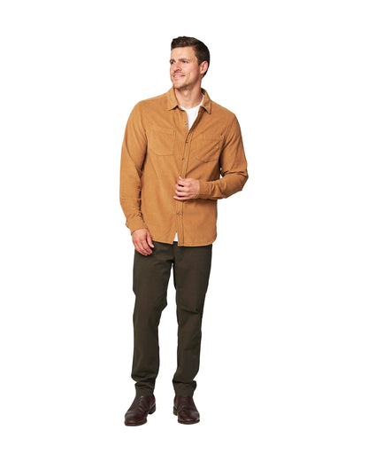 Full front view of a male model wearing the Okanui Corduroy Ledge Long Sleeve Shirt in Sand colour.