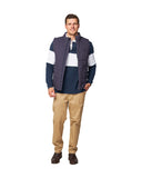 A male model wearing the Okanui Navy Heather Port Vest in Navy over a rugby navy/white shirt.