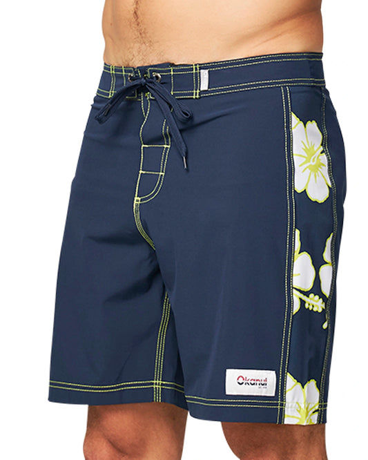 Close up side view of the Okanui Way Back When Boardrider Boardshort in Navy Lime Color.