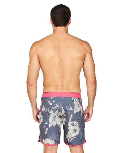 Back view of a male model wearing the Okanui Noosa Retro Boardrider Boardshort in Flint Stone color.