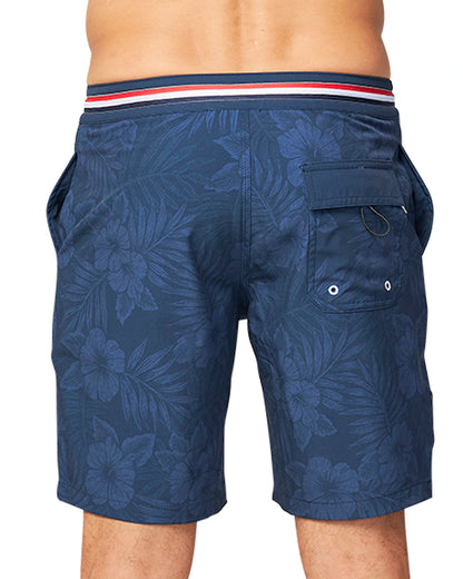 A close up back view of the Okanui Midnight Jungle Boardrider Boardshort in navy color.