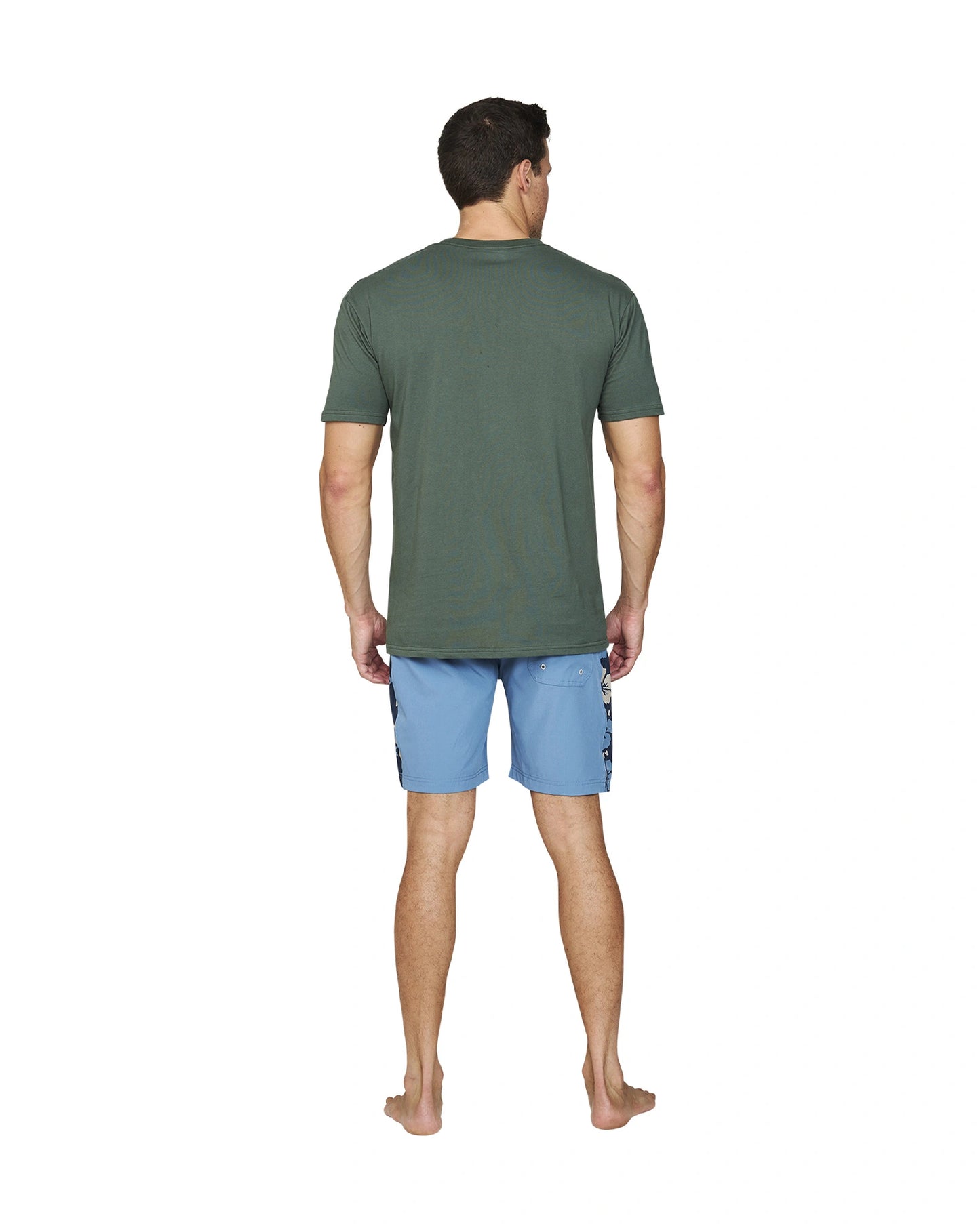 Back view of a male model wearing the Okanui Collage Boardrider Boardshort in Steel colour and a green t-shirt.