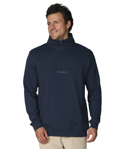 A navy blue-colored sweatshirt with front zipper.