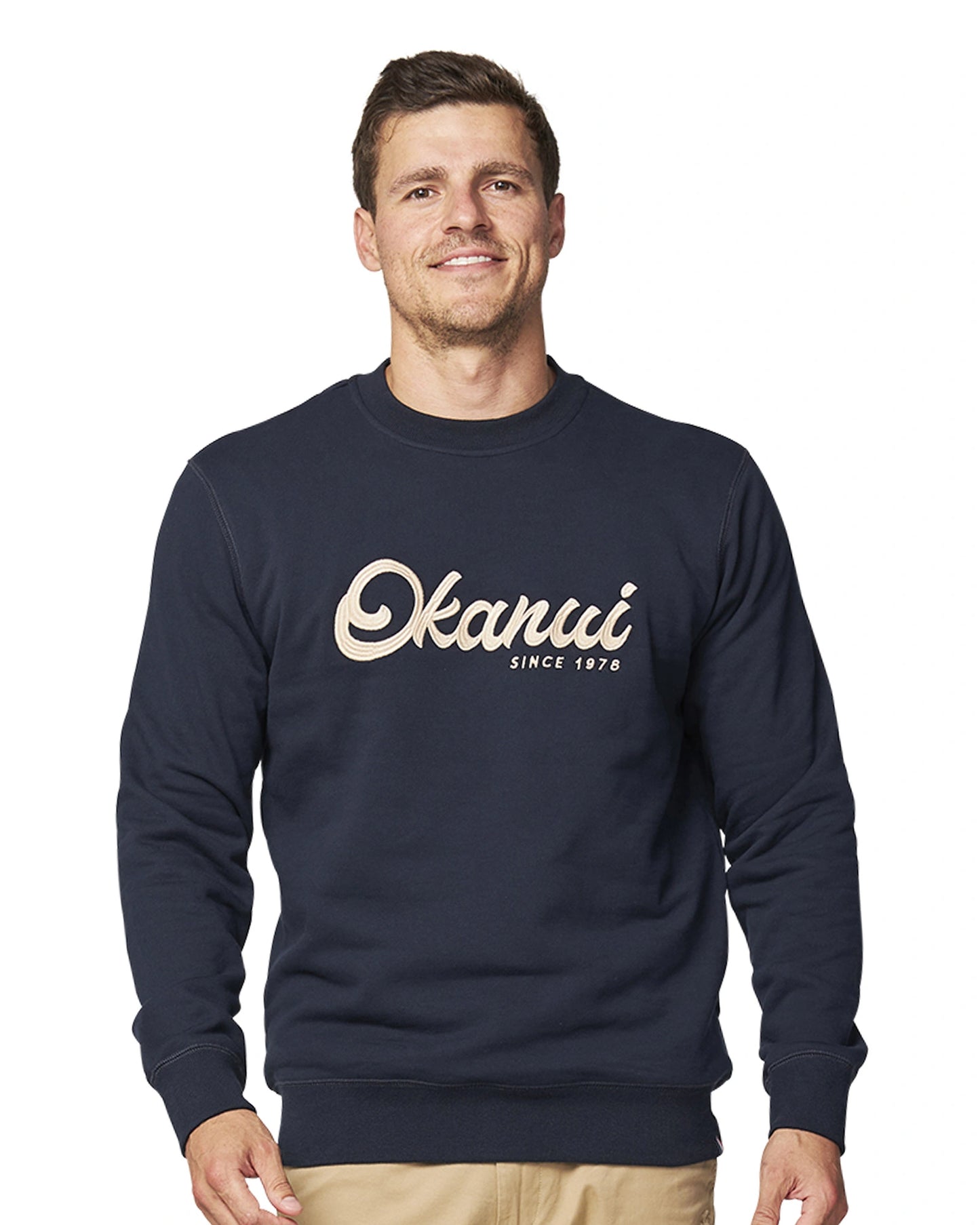 A sweatshirt in the color navy blue with white  Okanui logo in the middle of the chest.