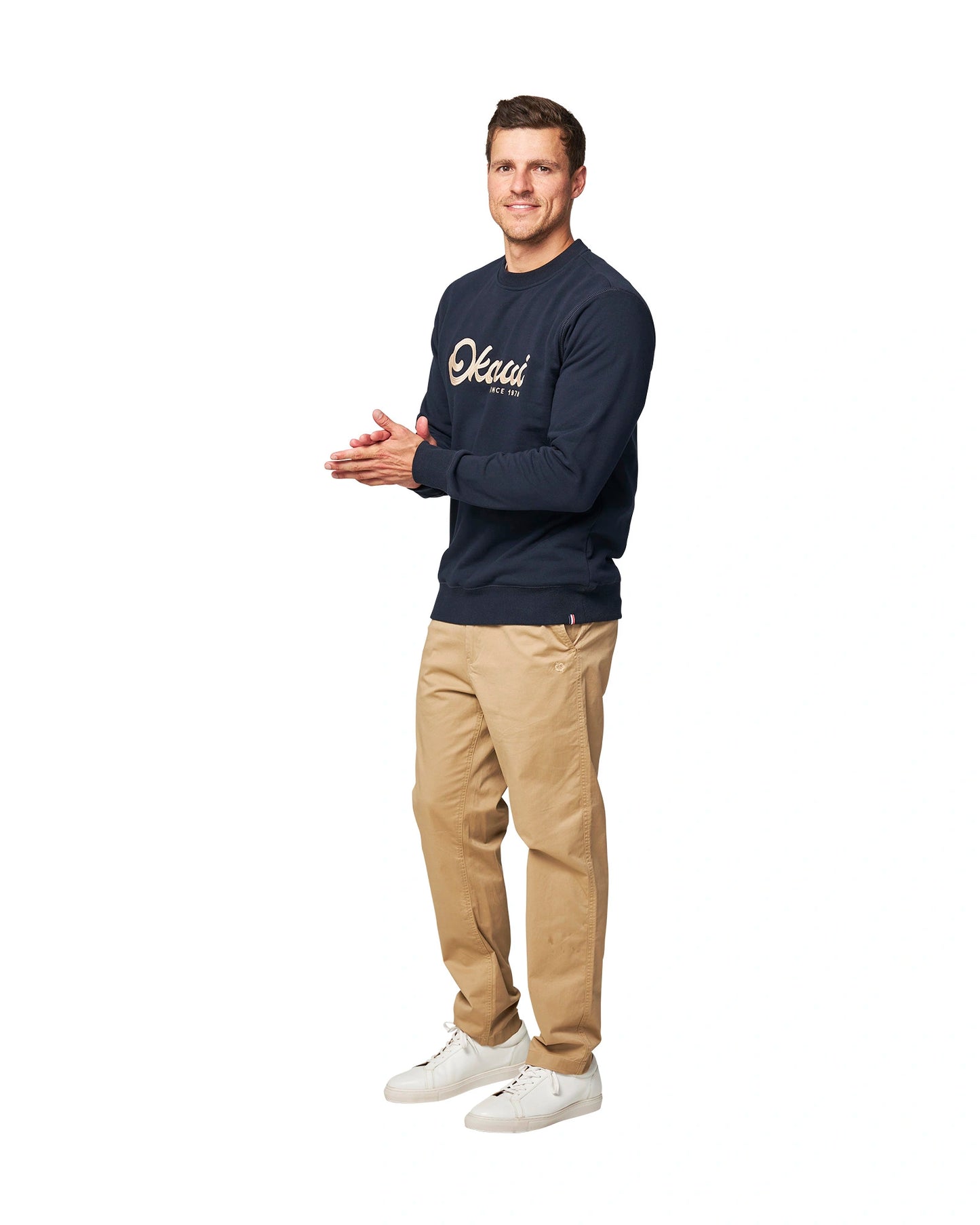 A navy-colored sweatshirt with Okanui logo in the middle part showing the side part. 