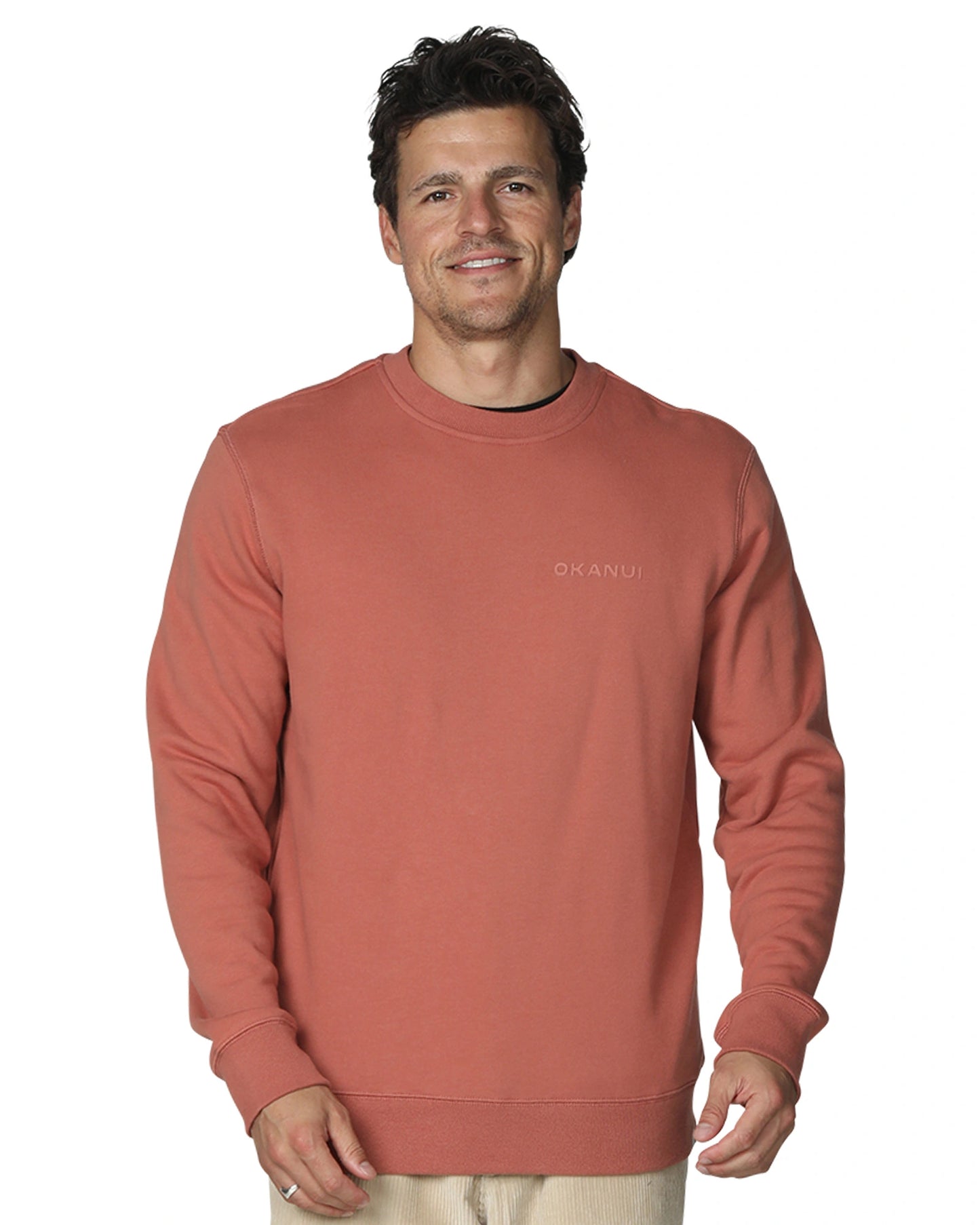 A winter sweatshirt in color rust in a white background. 