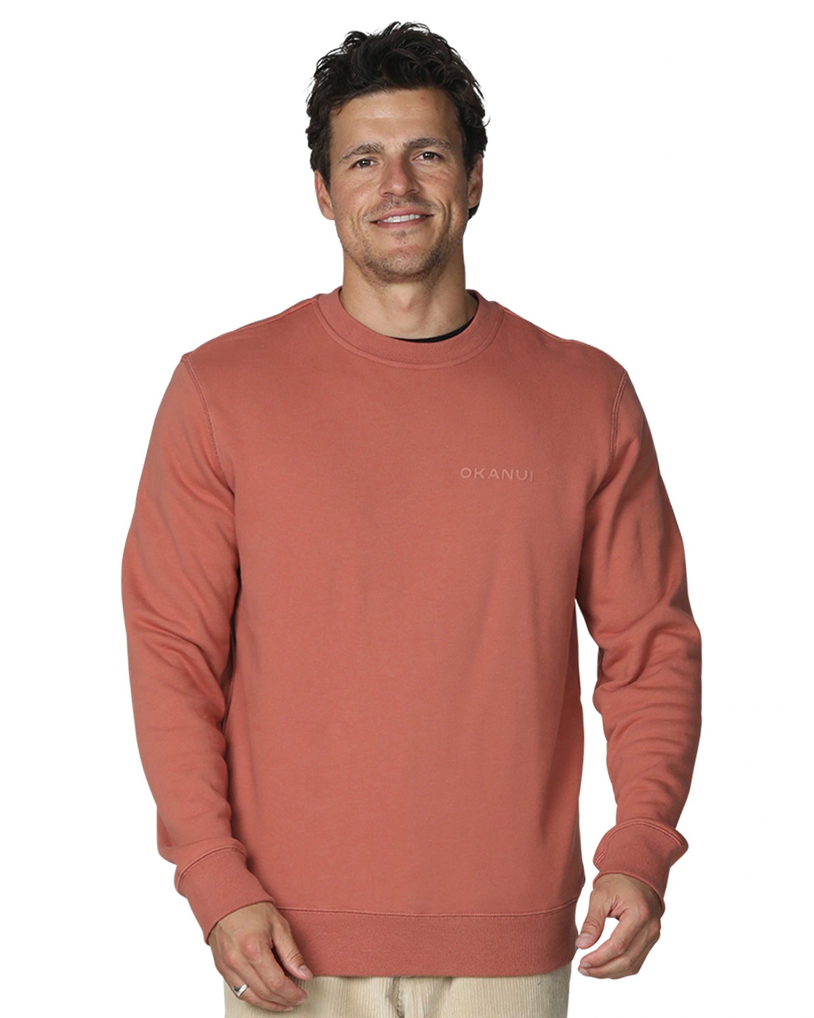 A winter sweatshirt in color rust in a white background. 