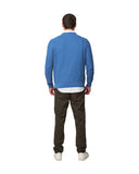 A back view of a male model wearing the Okanui Anchor Knit in Blue Marle color.