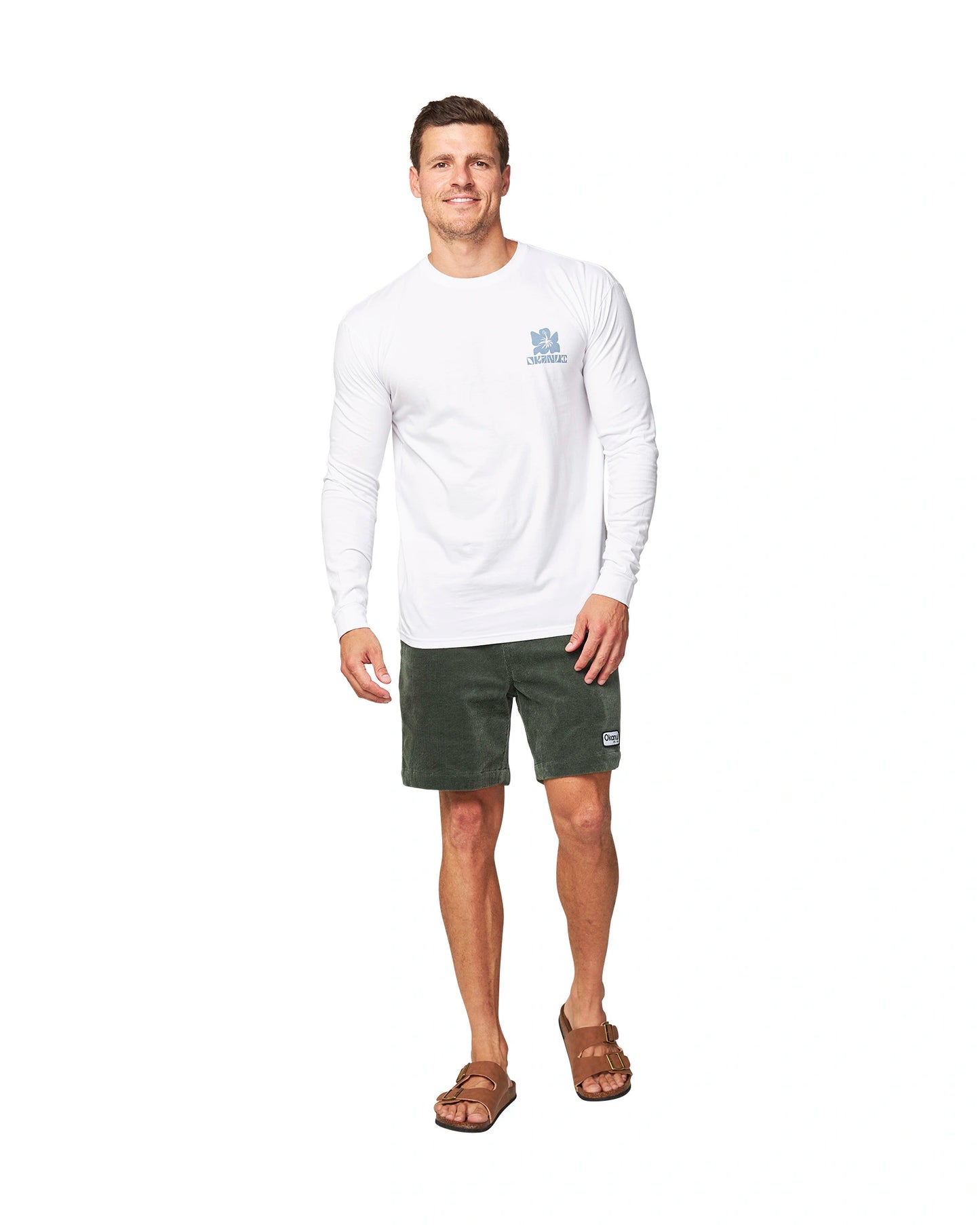 Full body front view of a male model wearing the Okanui Jungle long sleeve t-shirt in White variant