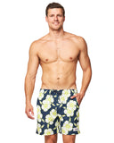 Front view of half naked male model wearing the Okanui Way Back When stretch swim short in Navy lime color