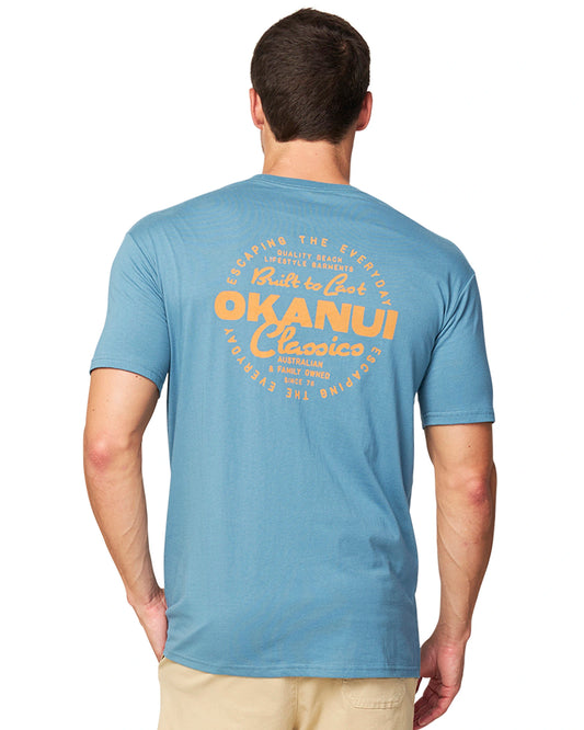 The Okanui Last Stand T-Shirt in Steel colour featuring the yellow print on the back.