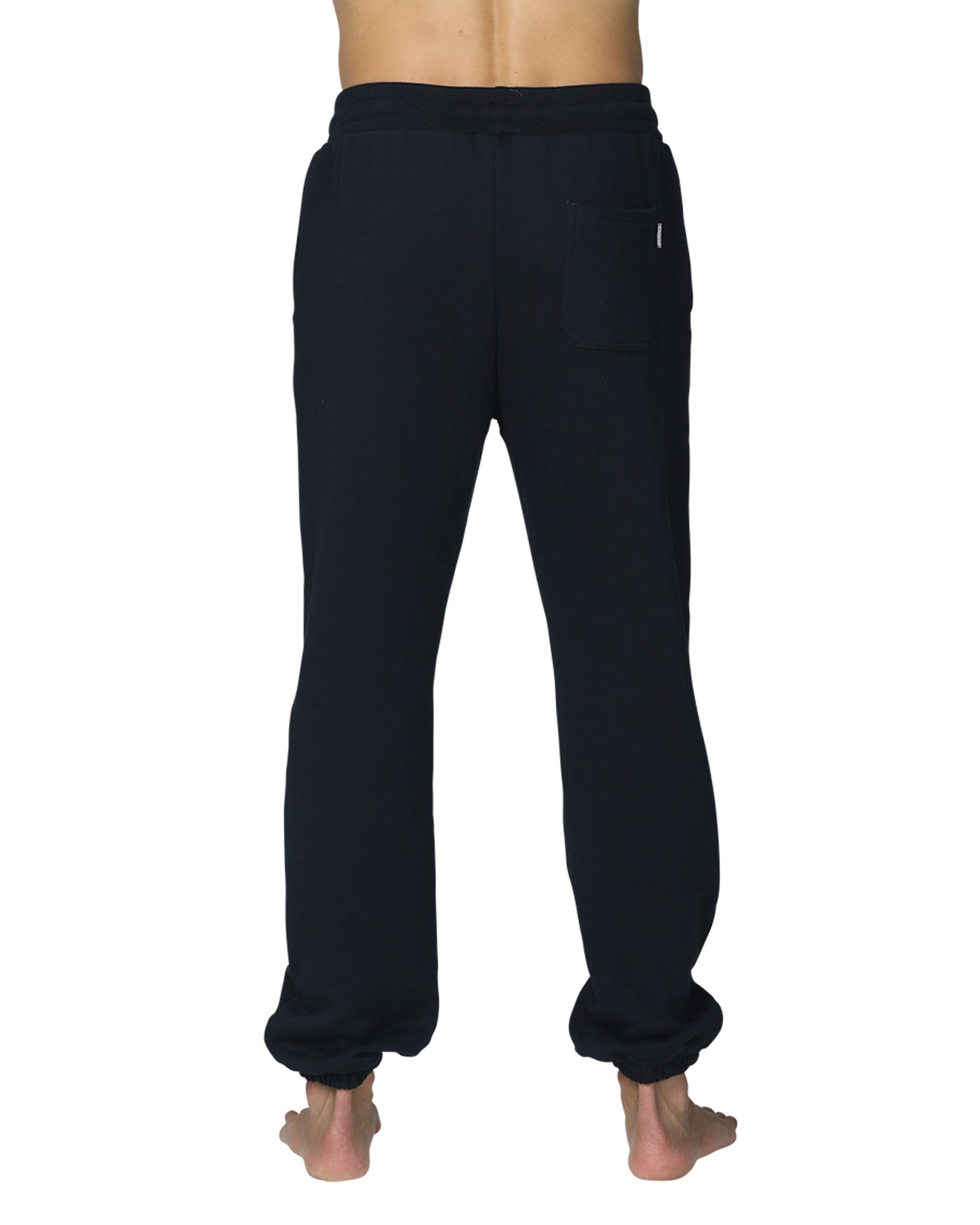 A close up back view of the Okanui Navy Signature Track Pants in Navy colour.