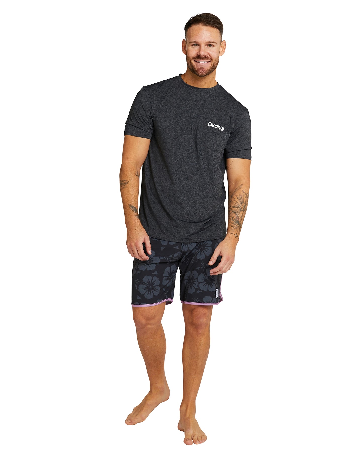 Men's spring short sleeve rashie in black showing the front details. 