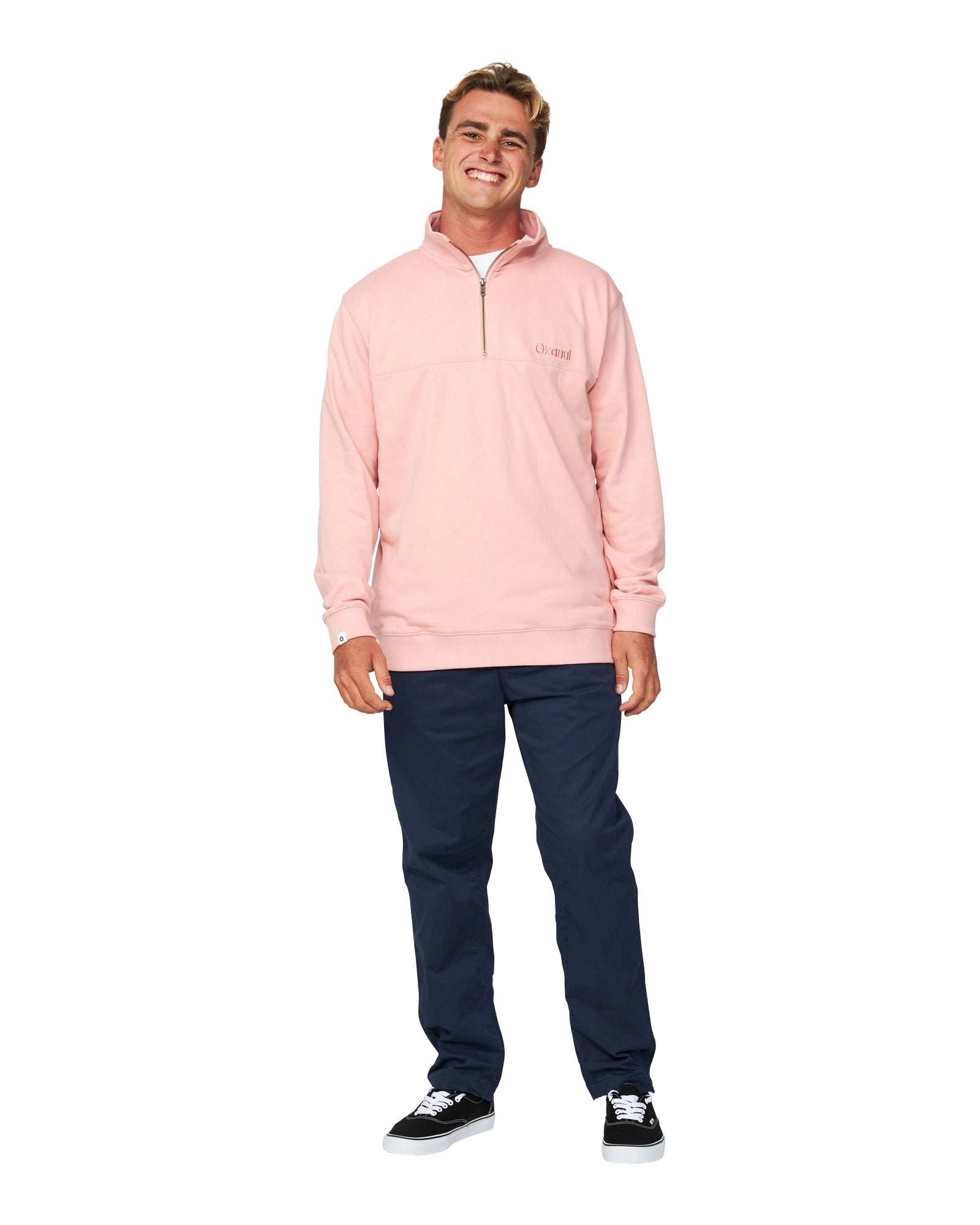 Full body view of a male model wearing the Okanui Clubhouse Crew Sweater in Dusty Pink.